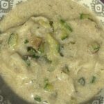 Steaming bowl of Dongwon Kalguksu topped with green onions